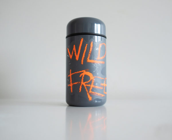 Wild Free vinyl sticker waterproof by Fabi Aguilar surf tribal illustration steel bottle